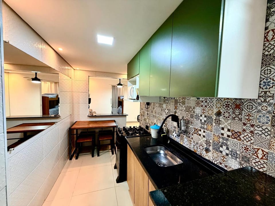 Dining area, minibar, oven, stove
