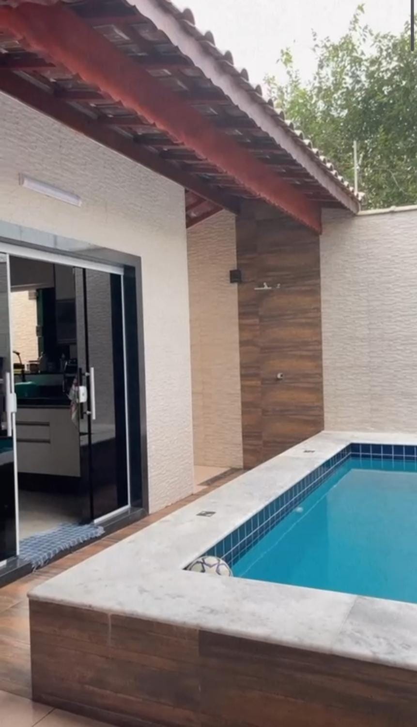 Casa com piscina em praia grande piscina aquecida House in State of São Paulo