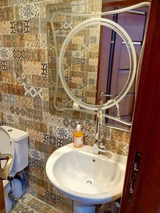 جناح فندقي أمام جامعة المنصورة Apartment in Egypt