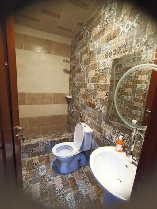جناح فندقي أمام جامعة المنصورة Apartment in Egypt