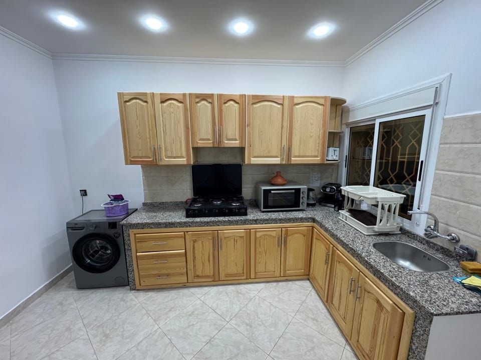 Kitchen or kitchenette, oven, stove, toaster