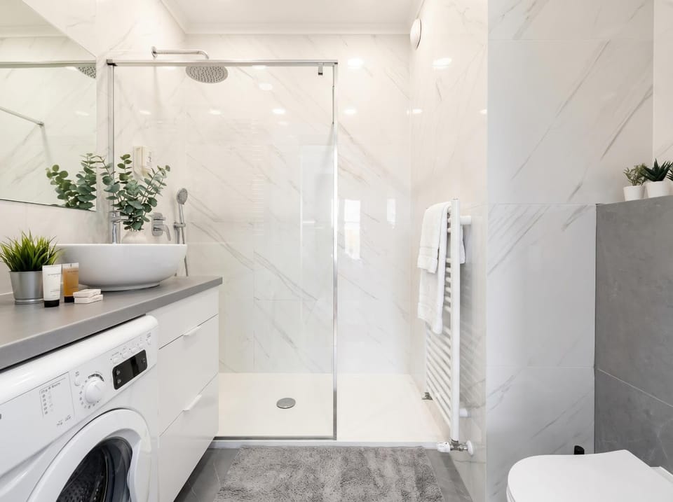 Shower, Toilet, Bathroom, towels, washing machine, dryer