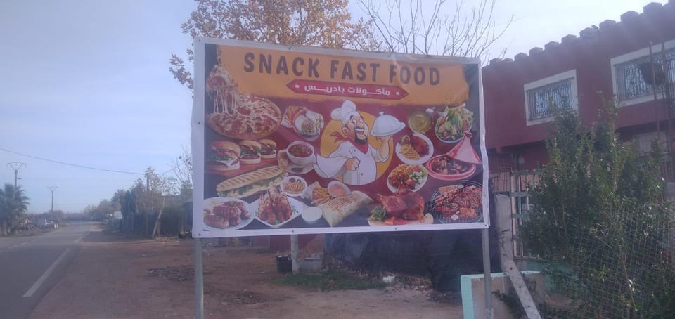 Day, Property logo or sign, Food and drinks, Logo/Certificate/Sign, Food, Text overlay, Street view, Certificate/Award