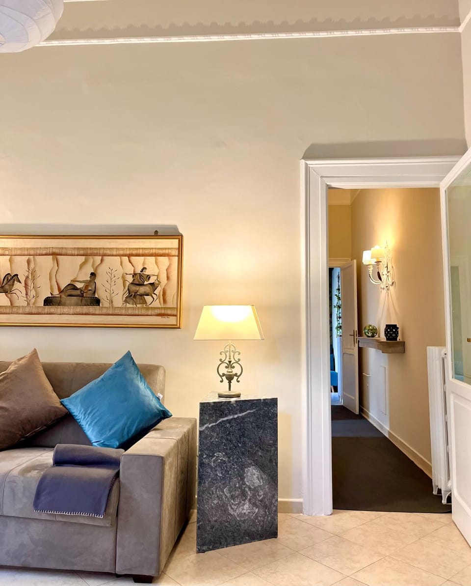 Bed, Living room, Seating area, Bedroom