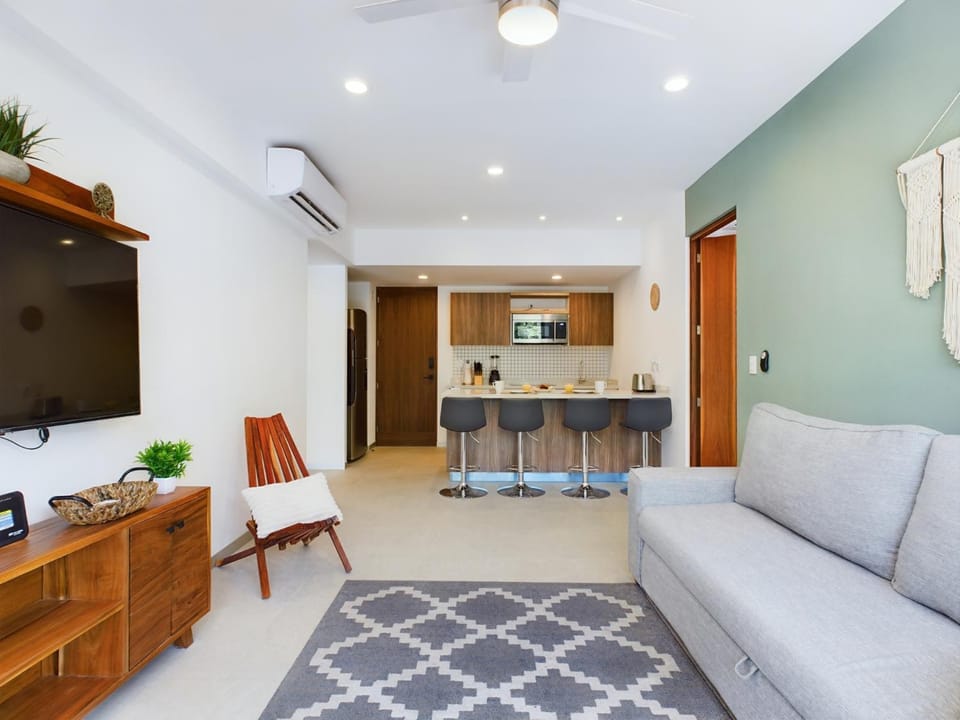 Kitchen or kitchenette, Living room, Seating area, Dining area