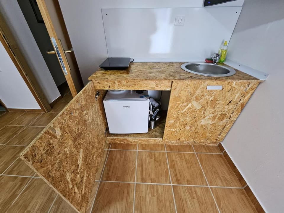 Kitchen or kitchenette, stove