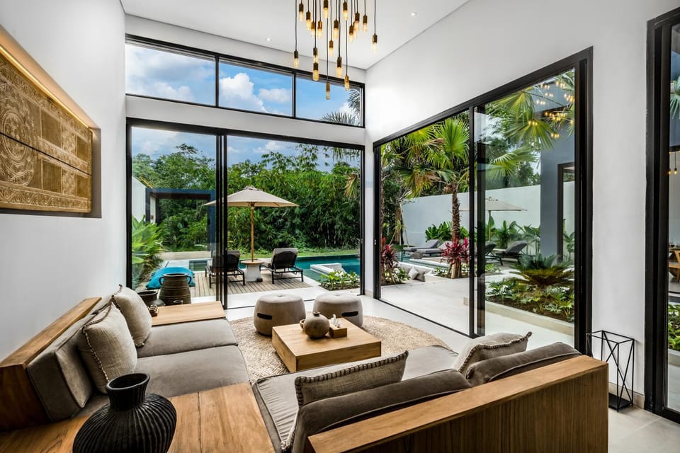 Property building, View (from property/room), Living room, Seating area, Pool view