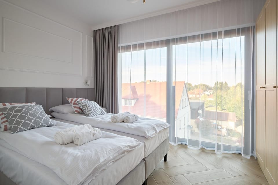 Nearby landmark, Bed, Off site, People, Neighbourhood, View (from property/room), Balcony/Terrace, Other, Photo of the whole room, Decorative detail, Bedroom, Guests, City view, Mountain view, River view, Street view, Area and facilities, Area and facilities, Entertainment, Seasons, Time of day, Location, children, young children, older children, group of guests, Family, Parking, furniture, heating, heating, internet, locker, towels, air conditioner, air conditioner
