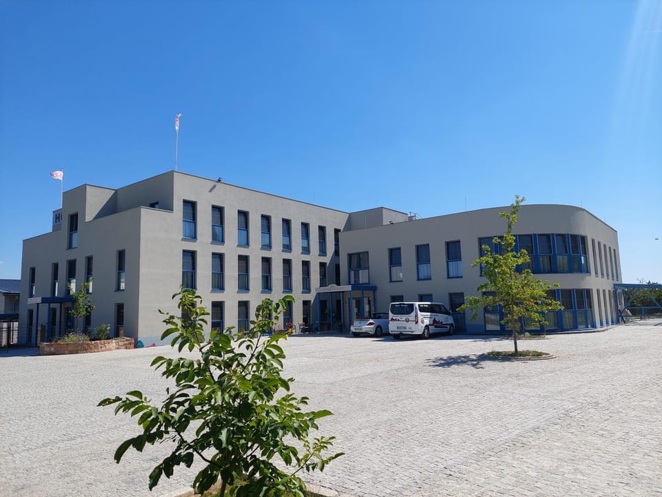 Property building, Day, Location, Parking