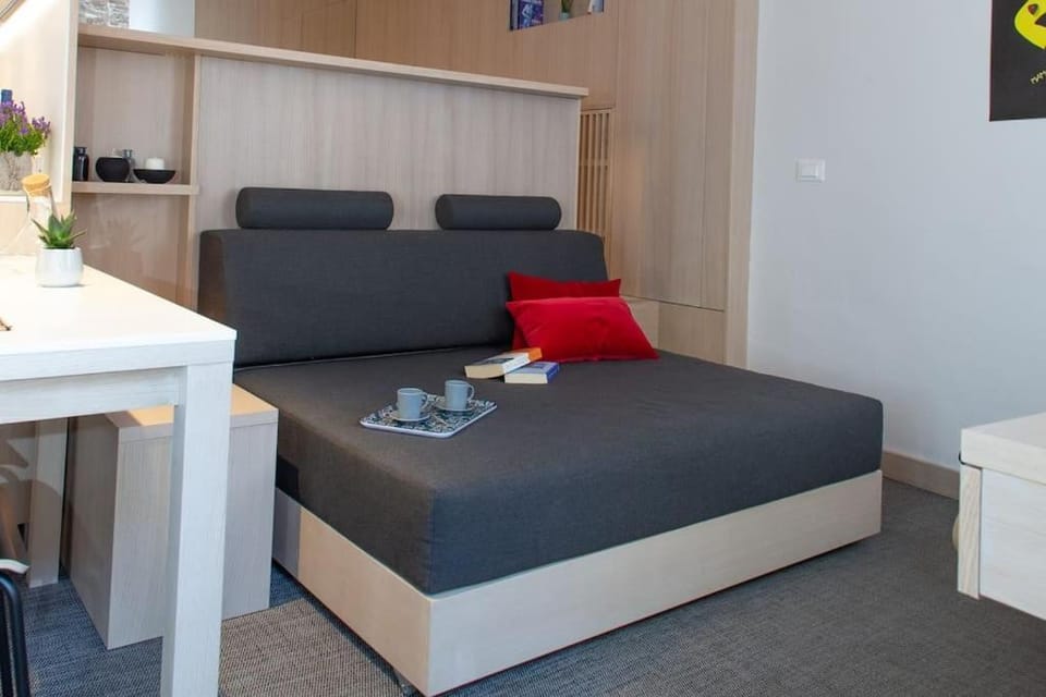 Bed, Living room, Seating area