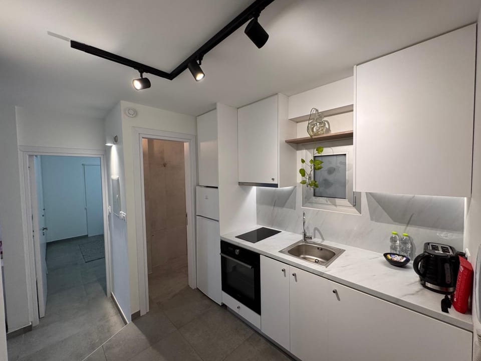 Kitchen or kitchenette, oven, stove