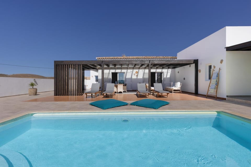 Property building, Living room, Swimming pool