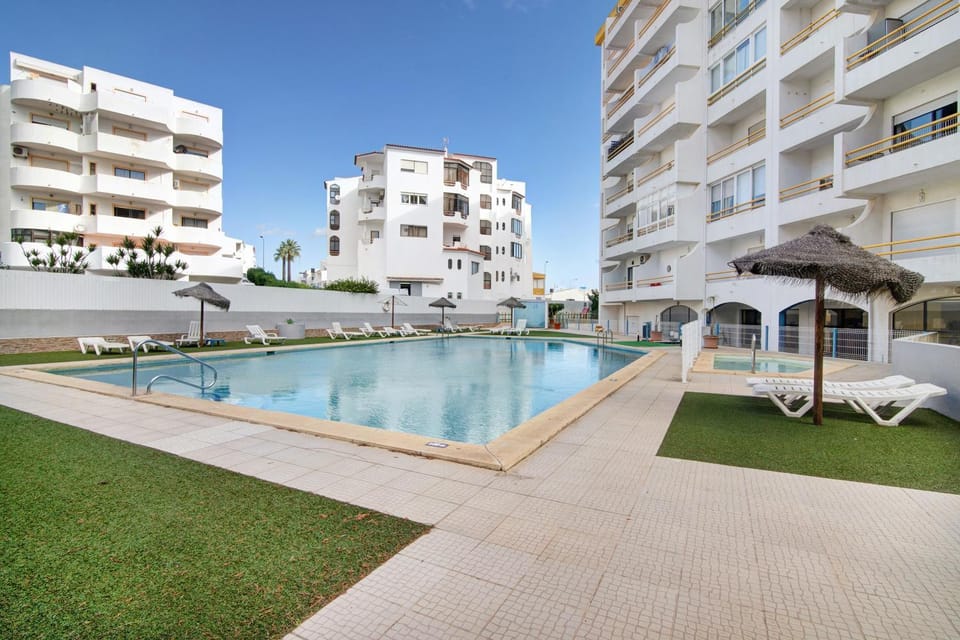 Property building, Living room, Swimming pool