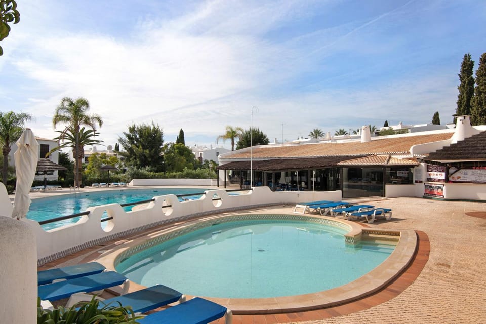 Property building, Living room, Swimming pool