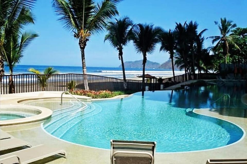 View (from property/room), Balcony/Terrace, Beach, Pool view, Sea view, Swimming pool, Swimming pool, locker, sunbed