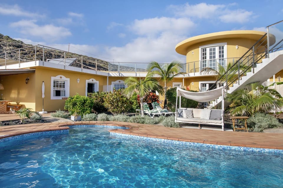 Property building, Living room, Swimming pool