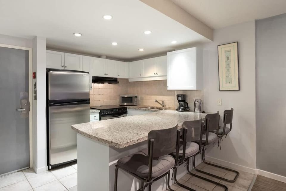 Woodrun Lodge 107 | New Listing! Ski-in, Ski-Out, Heated Pool, Hot Tub & Parking House in Whistler