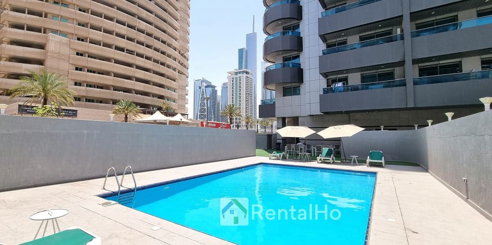 Property building, Day, City view, Pool view, Swimming pool, sunbed