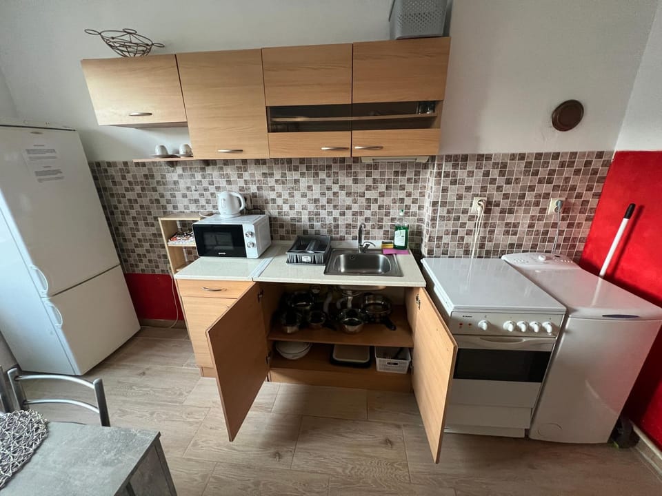 Kitchen or kitchenette, stove