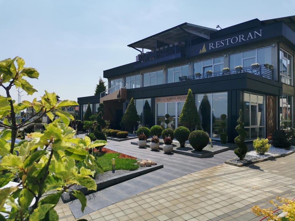 Property building, Restaurant/places to eat, Property logo or sign, Logo/Certificate/Sign