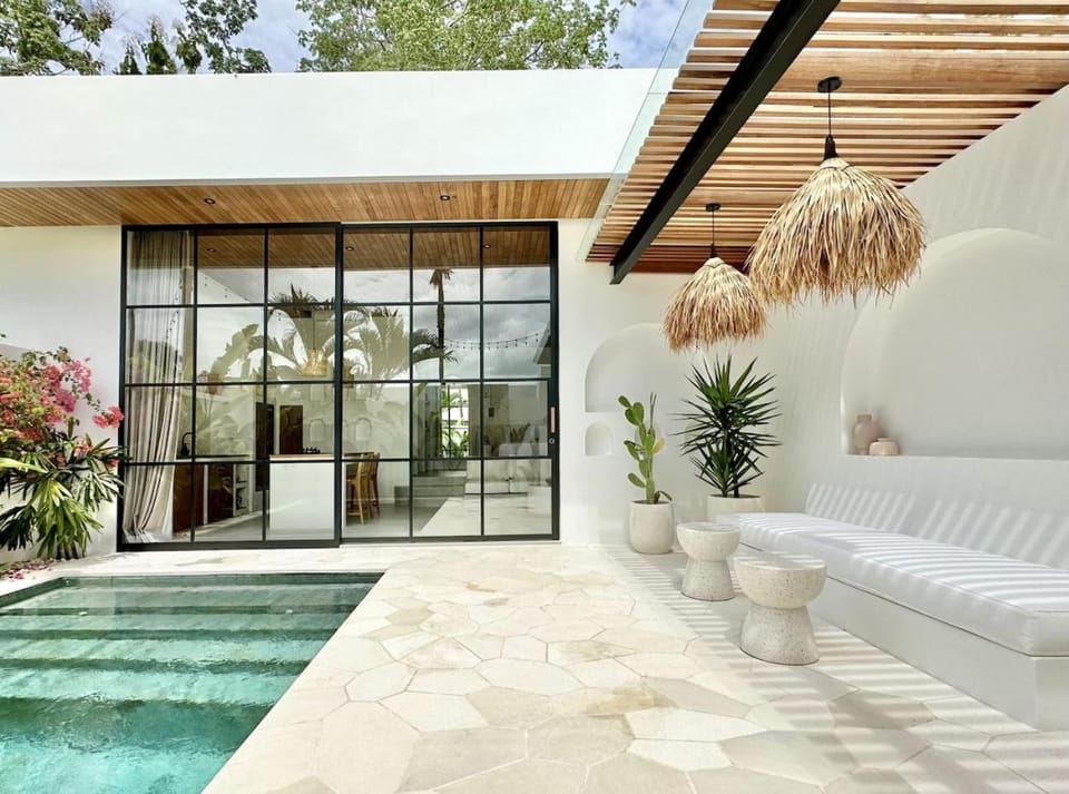 Property building, Patio, Pool view, Swimming pool, sunbed