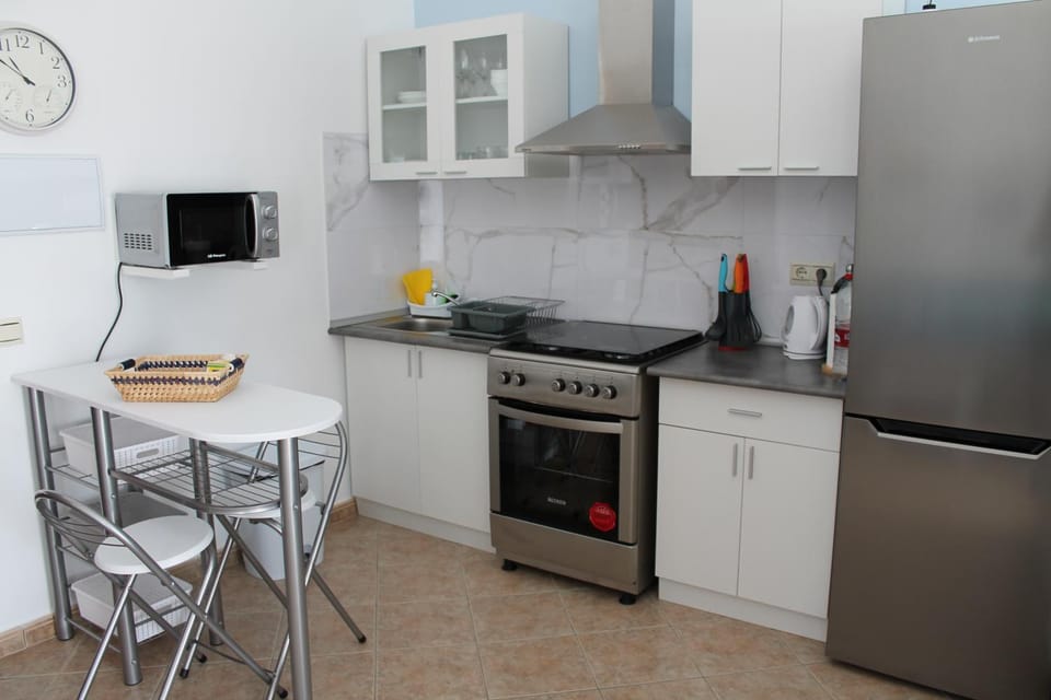 Kitchen or kitchenette, oven, stove, toaster, kitchen
