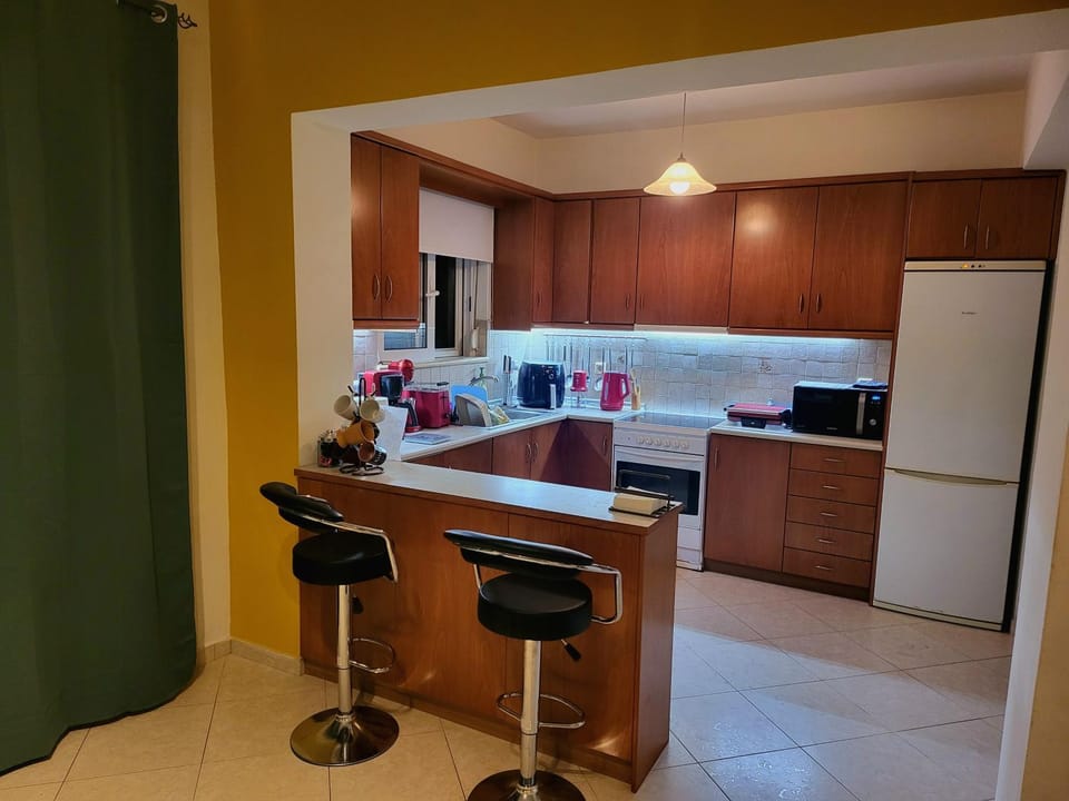 Kitchen or kitchenette, oven, stove, toaster