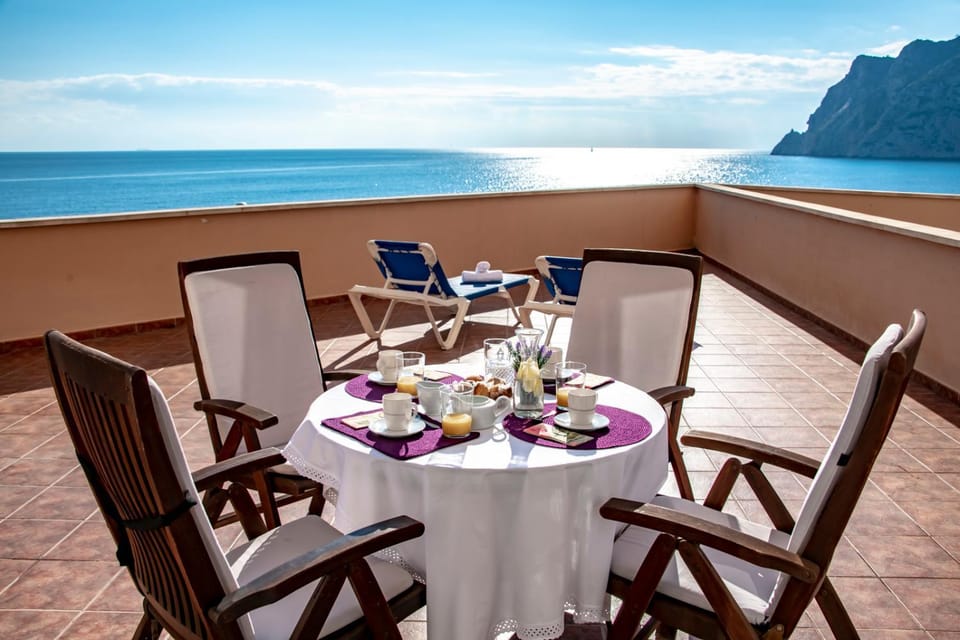Nearby landmark, Balcony/Terrace, Seating area, Sea view, sunbed