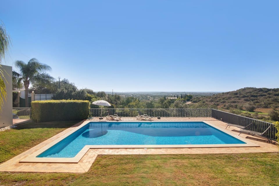 Property building, Living room, Swimming pool