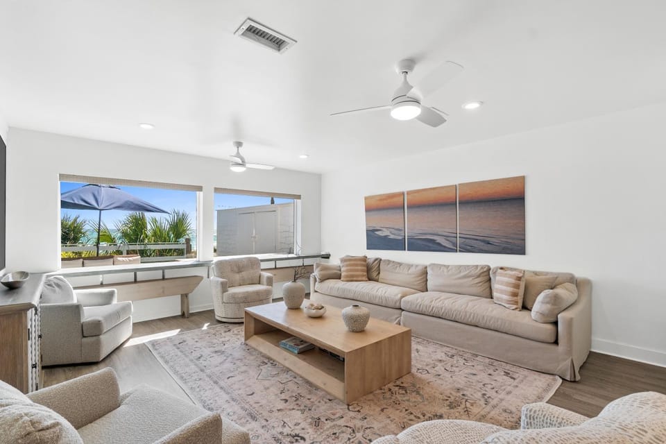 View (from property/room), Living room, Decorative detail, Seating area, Sea view, fireplace