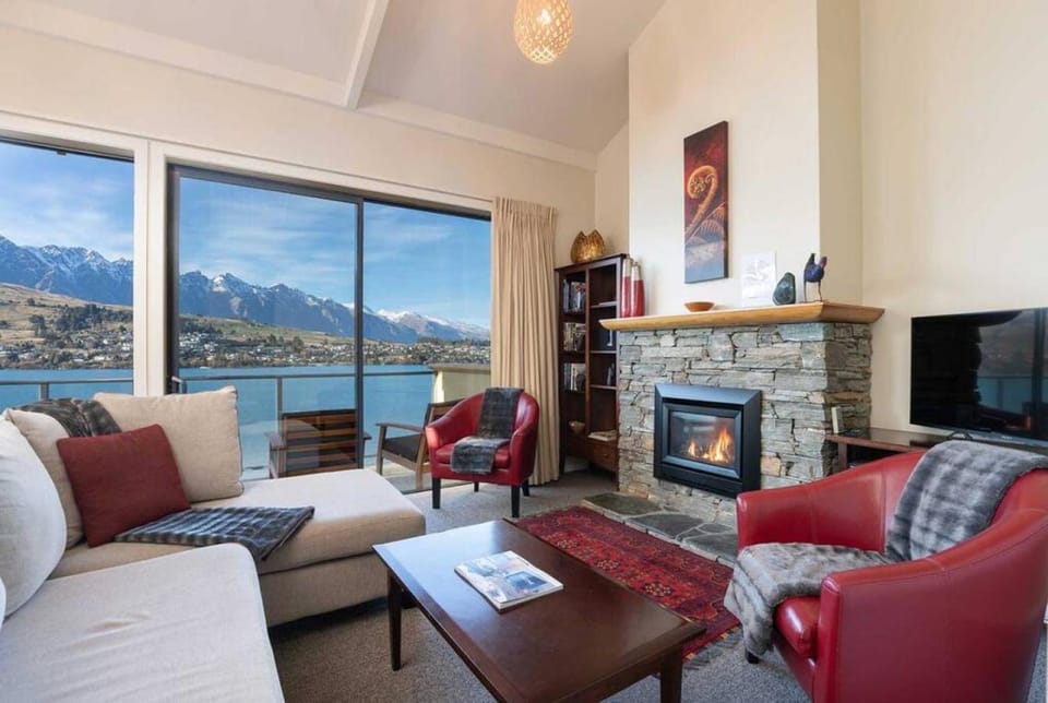 TV and multimedia, Living room, Seating area, Lake view, Mountain view, fireplace