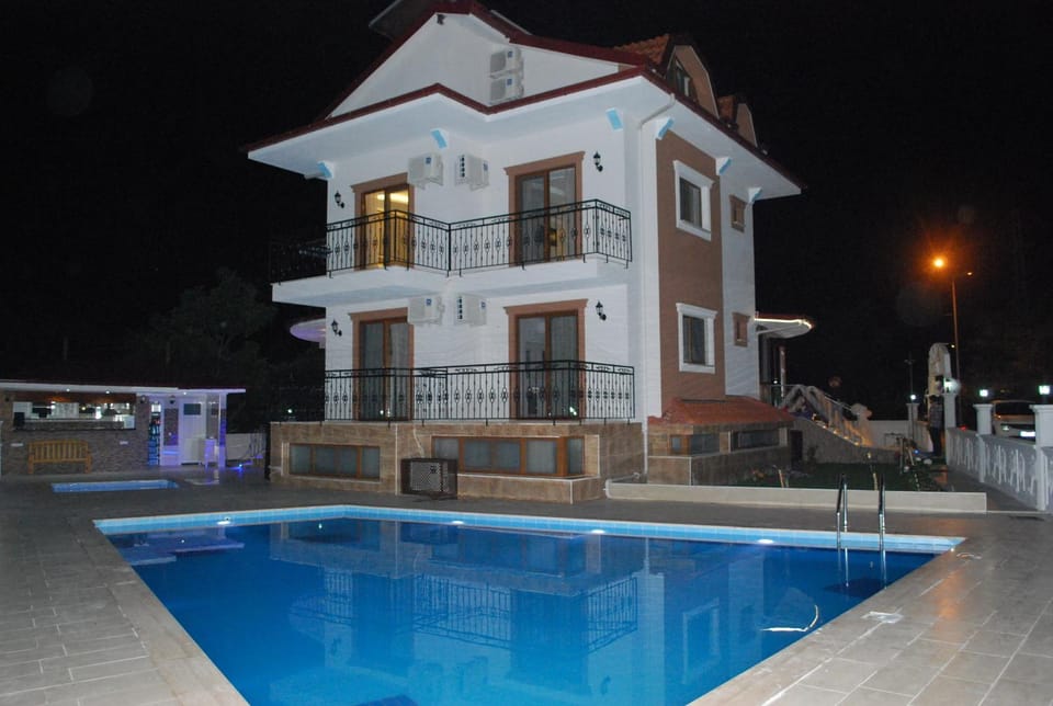 Property building, Night, Swimming pool, Swimming pool