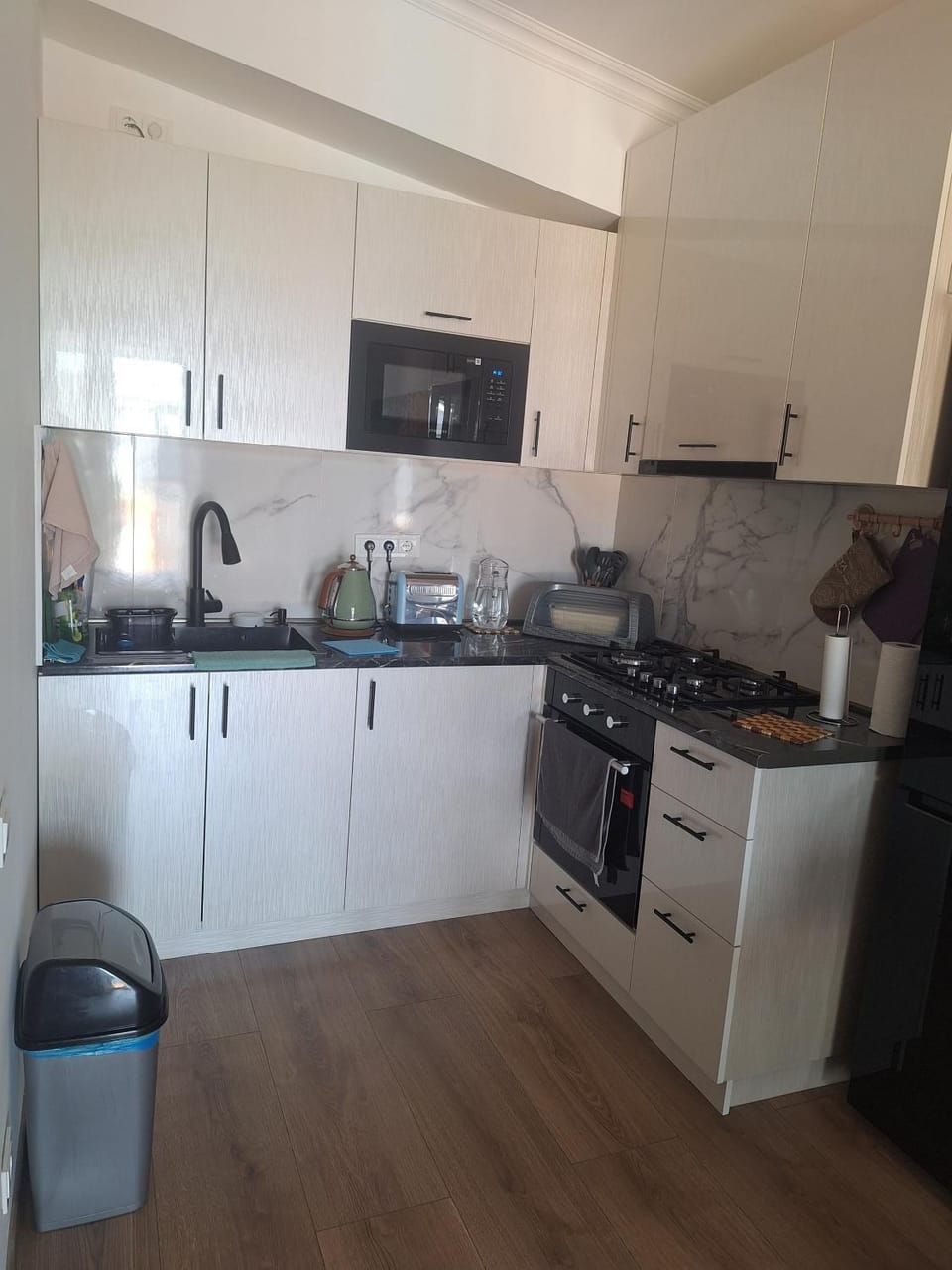 Kitchen or kitchenette, microwave, oven, stove, toaster