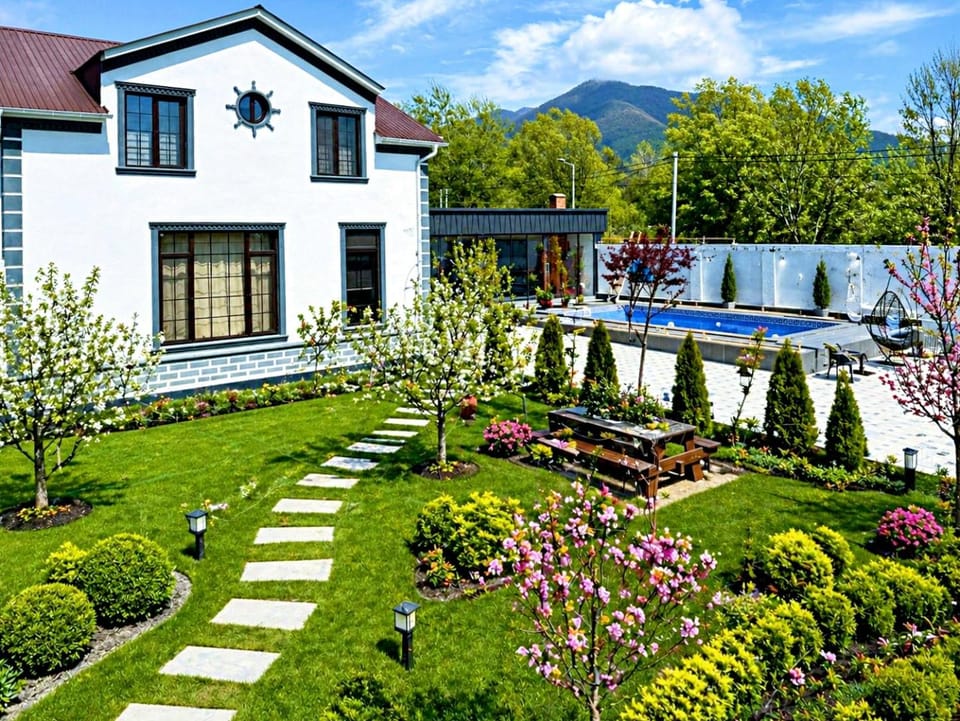 Property building, Spring, Day, Natural landscape, Garden, Garden view, Mountain view