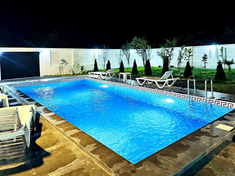 Night, Pool view, Swimming pool, sunbed