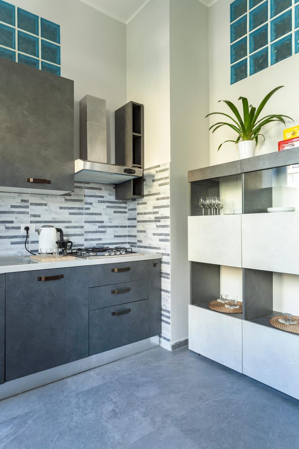 Kitchen or kitchenette, dishwasher, microwave, oven, stove