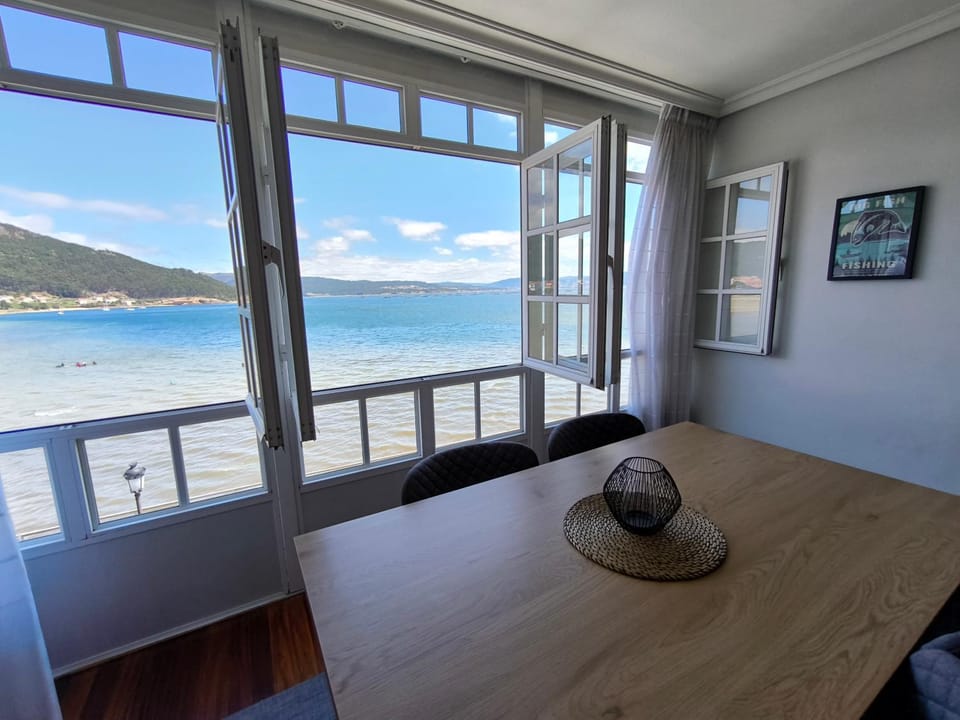 Natural landscape, Living room, Seating area, Dining area, Mountain view, Sea view