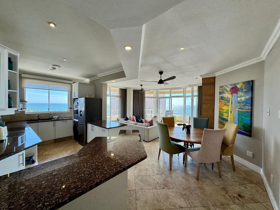 Kitchen or kitchenette, Living room, Dining area, Sea view