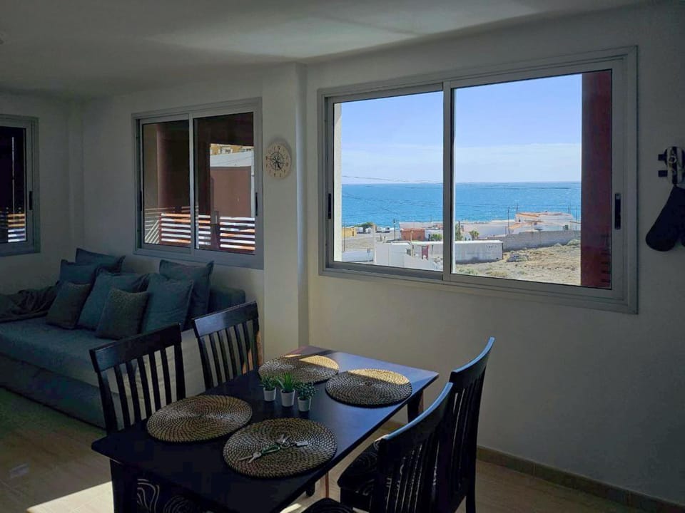 View (from property/room), Living room, Dining area, Sea view