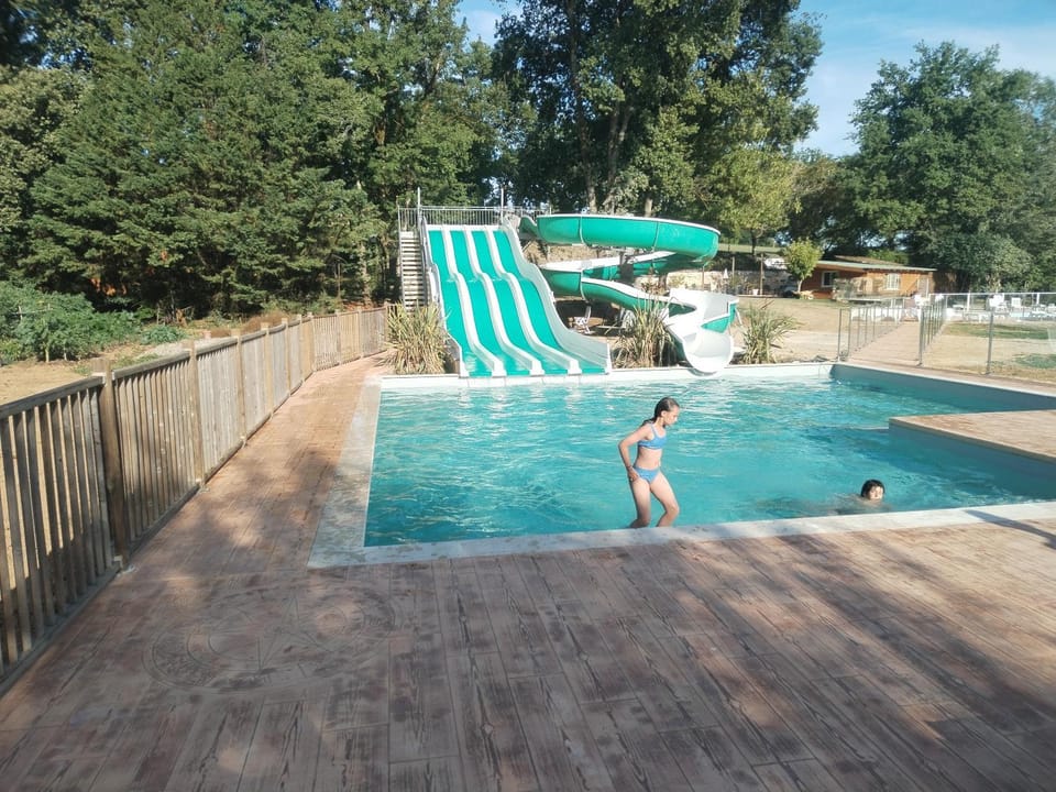 camping nature le Valenty Lot en vallée de la Dordogne toboggan géant piscine mini golf Campground/ 
RV Resort in Occitanie