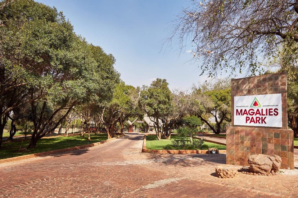 Property building, Facade/entrance, Property logo or sign, Garden