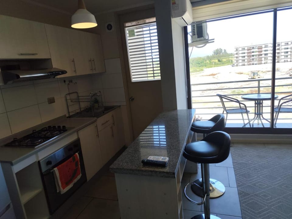 Kitchen or kitchenette, Living room, Seating area, oven, stove