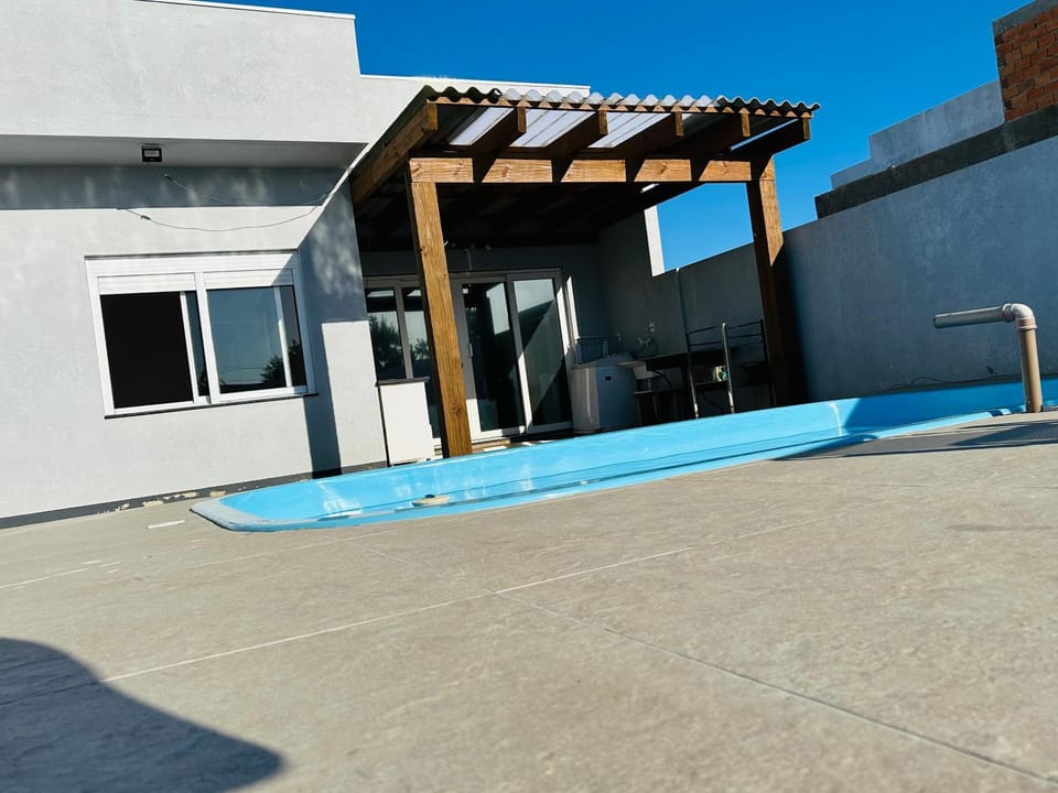 Casa piscina MAJU House in State of Rio Grande do Sul