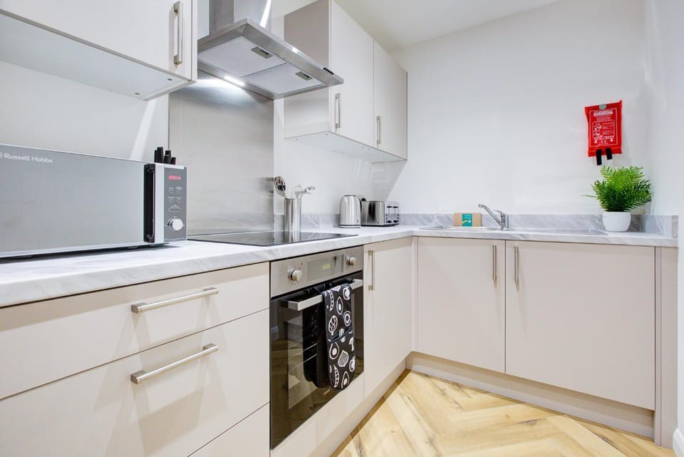 Kitchen or kitchenette, oven, stove, toaster