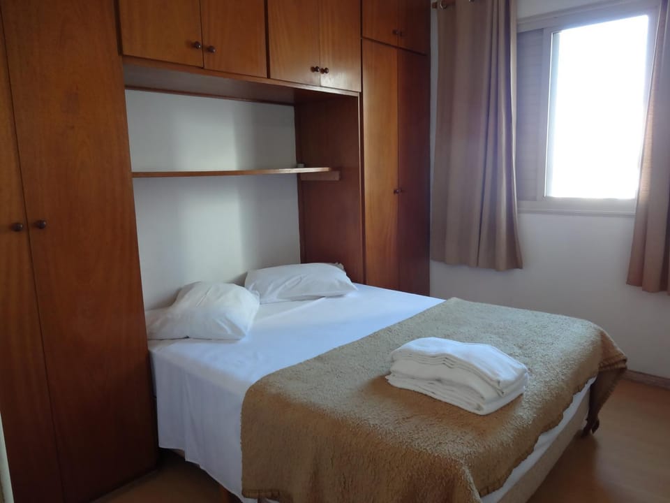 Bed, wardrobe