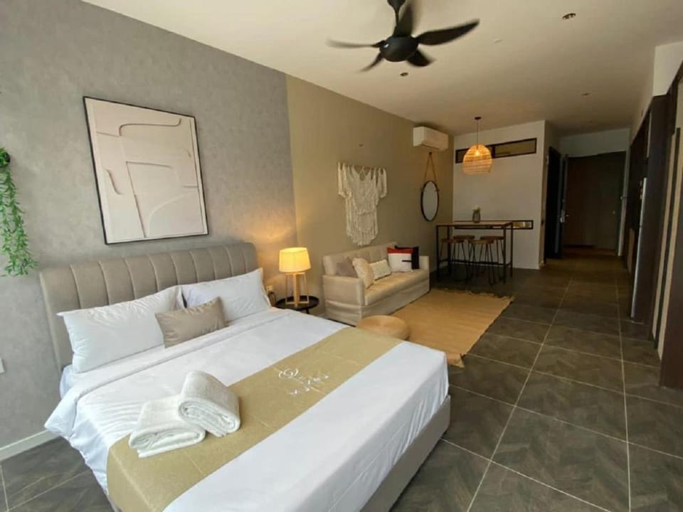 Bed, Kitchen or kitchenette, Living room, Seating area, towels, wardrobe, air conditioner