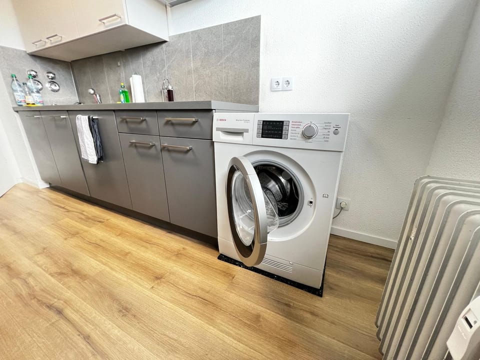 Kitchen or kitchenette, dishwasher, washing machine, dryer
