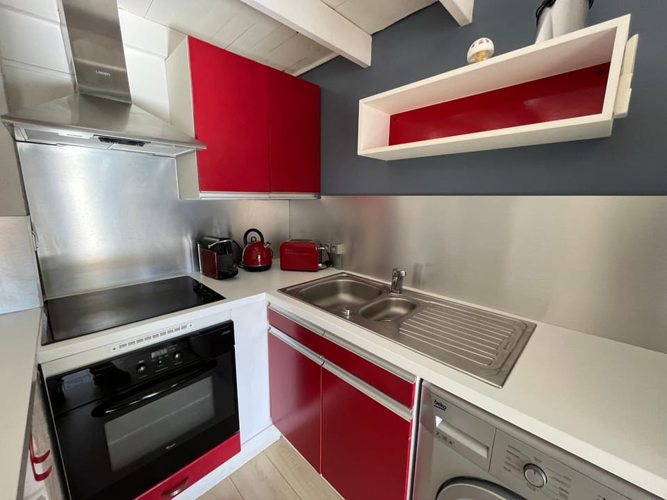 Kitchen or kitchenette, stove