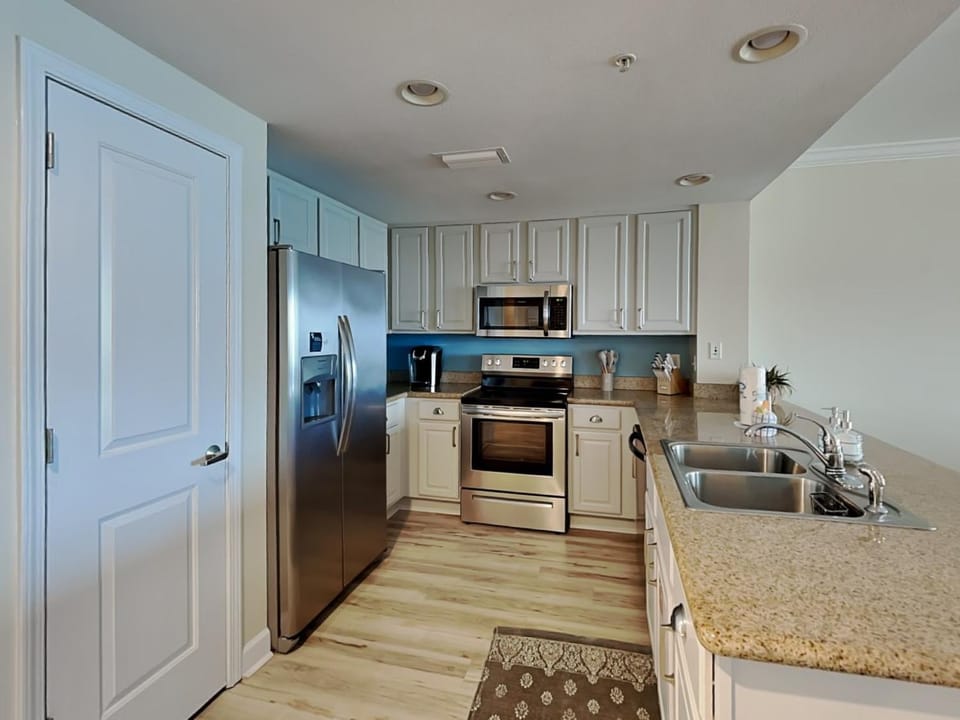 Kitchen or kitchenette, microwave, oven, stove, kitchen