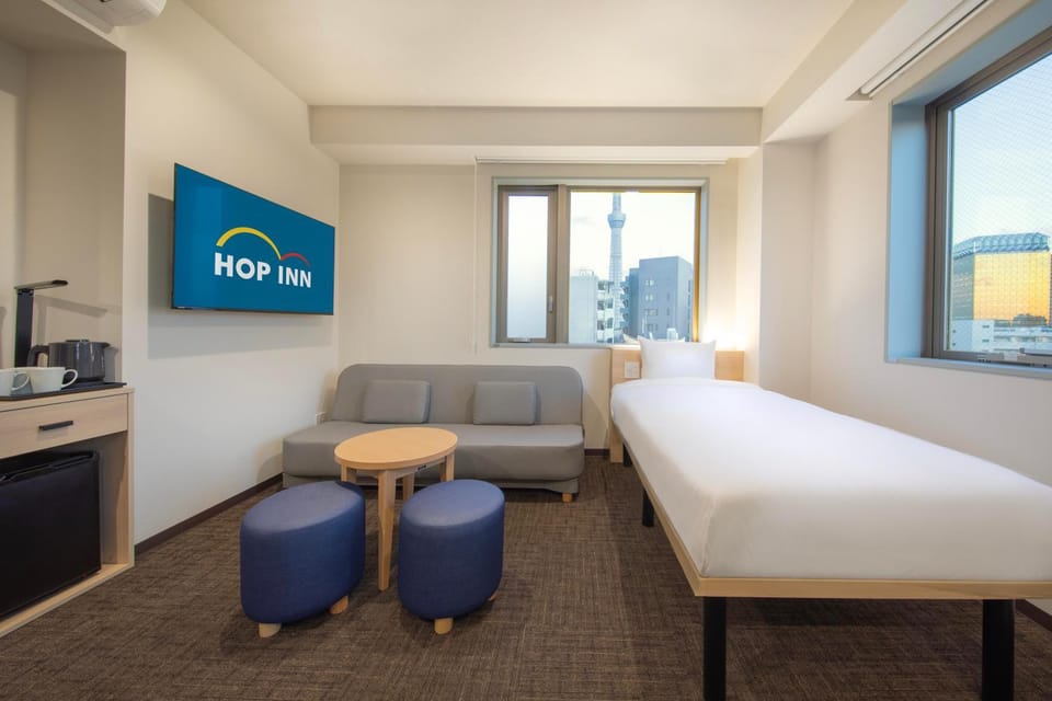Bed, Seating area, Bedroom